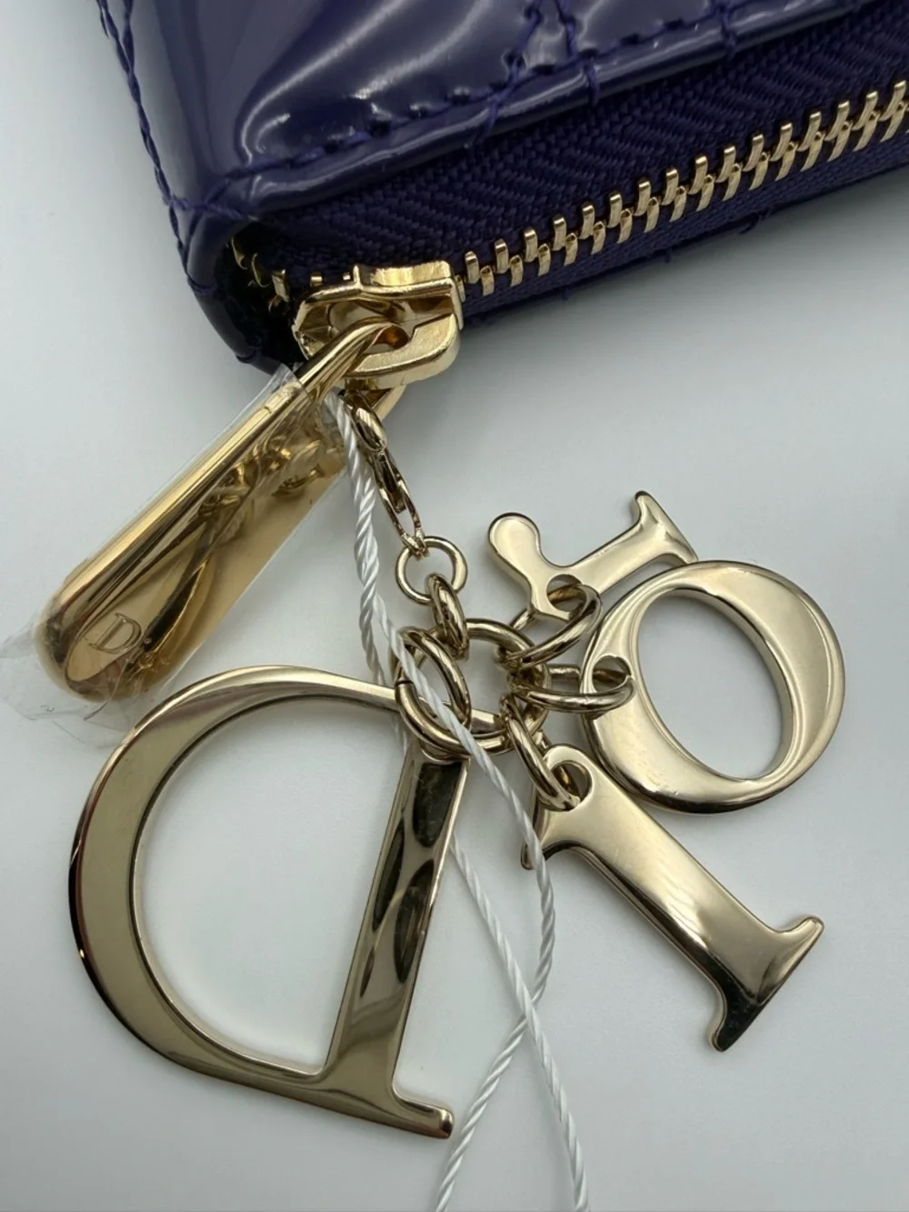 Dior Patent Quilted Zip Wallet in Deep Purple with Gold Charms